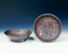 Pair of silver dishes, Ming dynasty, China, early 17th century. Creator: Unknown