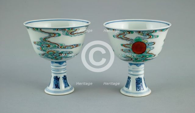 Pair of Stem Cups with Sun amid Clouds and Stylized Characters for 'Long Life' (Shou), Qing dynasty. Creator: Unknown.