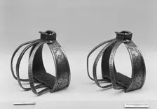 Pair of Stirrups from a horse armour made for a member of the Collalto Family, Italian, ca. 1560. Creator: Unknown