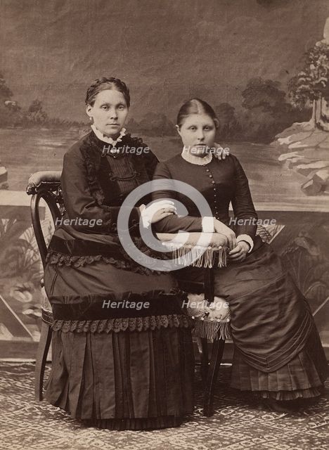 Paired photo portrait of Mamomnovs Mamakra Avdeevna and daughter Ekaterina Yakovlevna, 1890. Creator: Unknown.