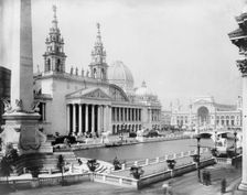 Palace of Mechanic Arts and lagoon at the World's Columbian Exposition, Chicago, Illinois, 1892. Creator: Frances Benjamin Johnston