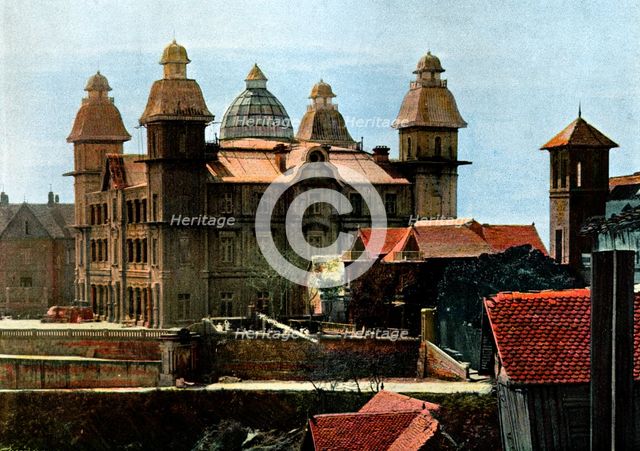 Palace of the ex-first minister, and the barracks of the marines, Madagascar, late 19th century.Artist: Gillot