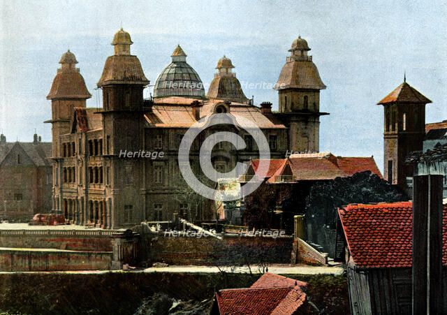 Palace of the ex-first minister, and the barracks of the marines, Madagascar, late 19th century.Artist: Gillot
