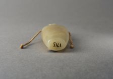 Pale Green jade snuff bottle with incised decoration, China, Qing dynasty, 1644-1911. Creator: Unknown