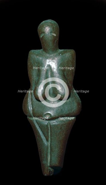 Paleolithic female figure of baked clay. Artist: Unknown