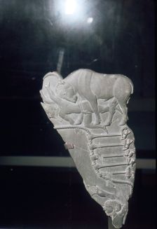 Palette with bull goring man, circa late 4th millennium BC