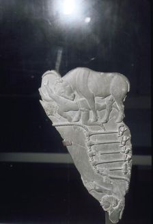 Palette with bull goring man, circa late 4th millennium BC