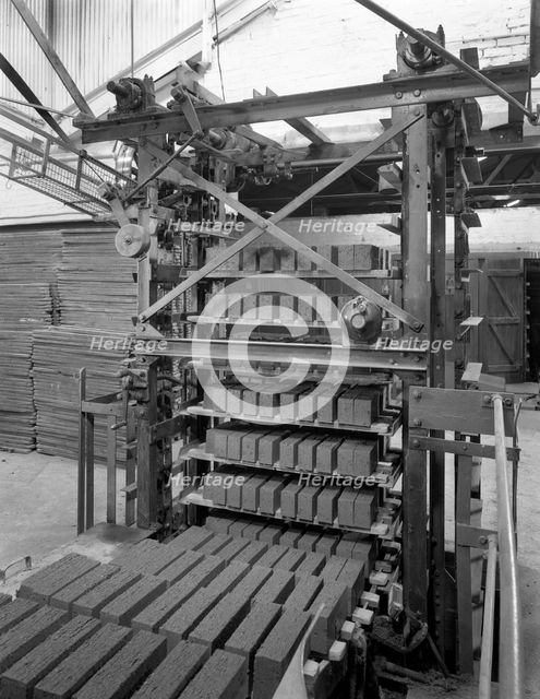 Palletising machine at Whitwick Brickworks, Coalville, Leicestershire, 1963. Creator: Michael Walters.