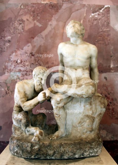 Pan and satyr, Pan removing a splinter from a satyr's foot. Artist: Unknown