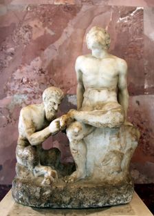 Pan and satyr, Pan removing a splinter from a satyr's foot