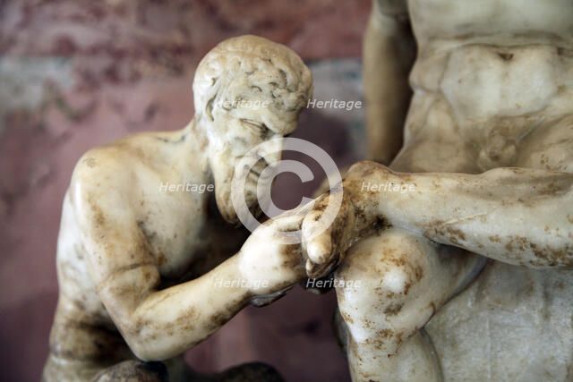 Pan and satyr, Pan removing a splinter from a satyr's foot. Artist: Unknown