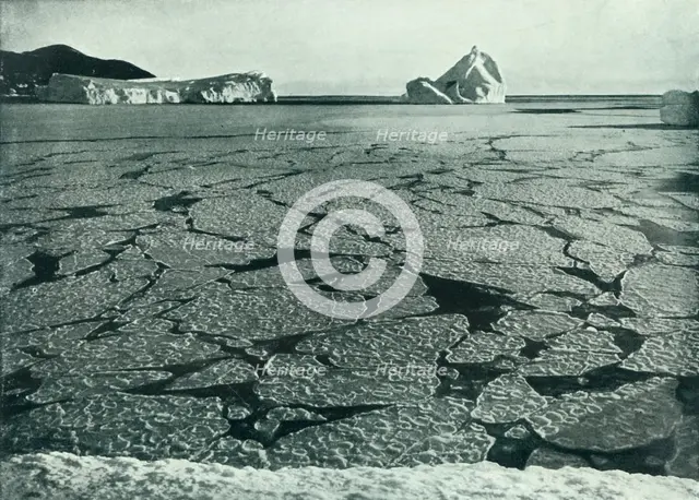 'Pancake Ice Forming Into Floes Off Cape Evans', c1910–1913, (1913).  Artist: Herbert Ponting.