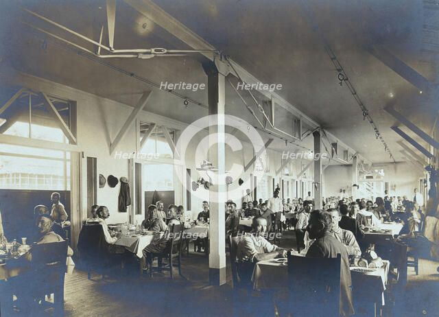 Panama Canal construction workers (American and European) dining in the Isthmian Canal..., c1910. Creator: Unknown.