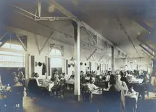 Panama Canal construction workers (American and European) dining in the Isthmian Canal..., c1910. Creator: Unknown