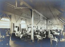 Panama Canal construction workers (American and European) dining in the Isthmian Canal..., c1910. Creator: Unknown