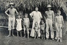 Panama Indian family outside a traditional hut, 1900/1910. Creator: Unknown