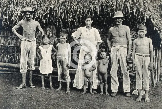 Panama Indian family outside a traditional hut,  1900/1910. Creator: Unknown.