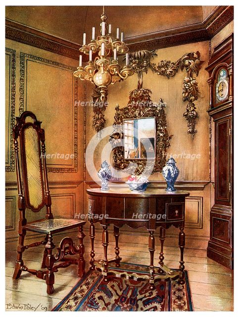 Panelling, mirror frame, walnut table and chair, Charles Wesley's walnut high case clock, 1910.Artist: Edwin Foley