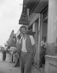 Panhandler on 7th Street, N.W., Washington, D.C., 1942. Creator: Gordon Parks
