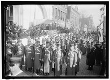 Parade with President Woodrow Wilson and Mrs. Wilson on reviewing stand, between 1910 and 1914. Creator: Harris & Ewing