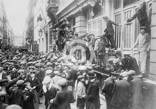 Paris, Newsboys waiting for "Extras", between c1914 and c1915. Creator: Bain News Service.