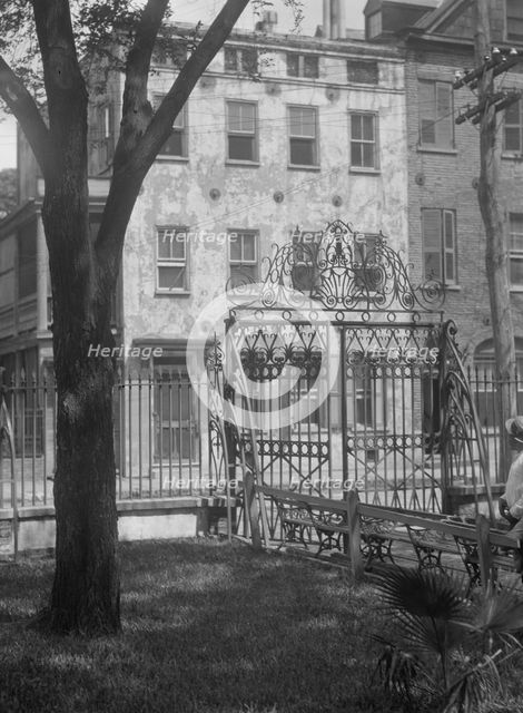 Park and houses, [36 Chalmers Street through Washington Park Gate], Charleston..., c1920-c1926. Creator: Arnold Genthe.