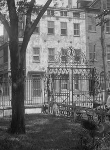 Park and houses, [36 Chalmers Street through Washington Park Gate], Charleston..., c1920-c1926. Creator: Arnold Genthe