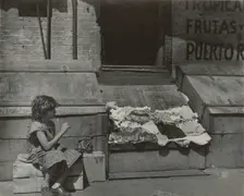 Park Avenue - Young girl selling clothes on the street, East Harlem, New York City, 1947 - 1951. Creator: Romulo Lachatanere