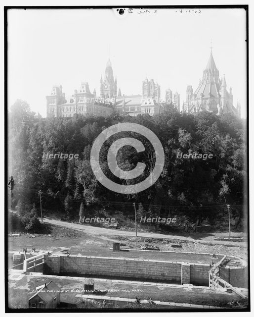 Parliament B'lg's, Ottawa, from Manor i.e. Major's Hill Park, between 1890 and 1901. Creator: Unknown.