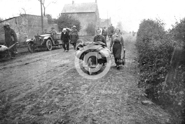 ''Parmi les populations delivrees; Pres de Maretz, entre le Cateau et Cambrai..., 1918. Creator: Unknown.