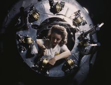 Part of the cowling for one of the motors for a B-25...North American Aviation, Inglewood, CA., 1942 Creator: Alfred T Palmer