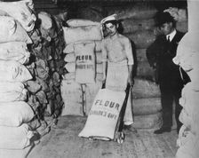 Part of Canada's gift of flour of the relief of war distress in England 1915