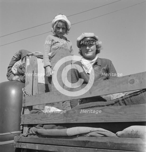 Part of family come for work in potatoes, Tulelake, Siskiyou County, California, 1939. Creator: Dorothea Lange.