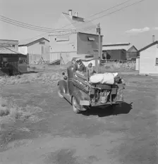 Part of family come for work in potatoes, Tulelake, Siskiyou County, California, 1939. Creator: Dorothea Lange