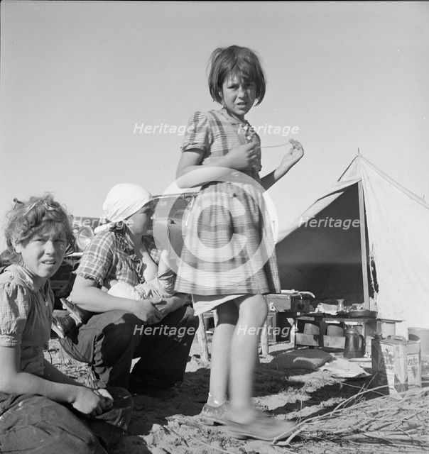Part of family arrived the night before...near Holtville, Imperial Valley, California, 1939. Creator: Dorothea Lange.