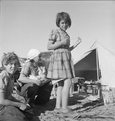 Part of family arrived the night before...near Holtville, Imperial Valley, California, 1939. Creator: Dorothea Lange