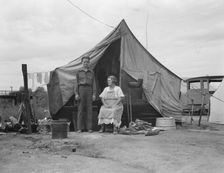 Part of migrant family of five encamped near Porterville, California, 1936. Creator: Dorothea Lange