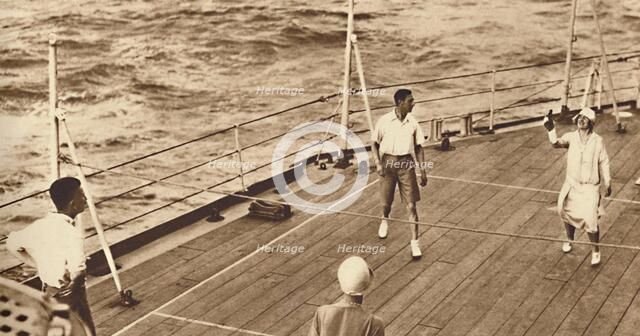 'Partners - A game of deck tennis in the Renown', 1927, (1937). Creator: Unknown.