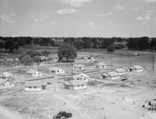 Partially completed homes for agricultural workers..., Farmersville, California, 1939. Creator: Dorothea Lange