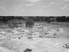 Partially completed homes for agricultural workers..., Farmersville, California, 1939. Creator: Dorothea Lange