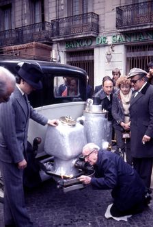 Participants in the rally Barcelona Sitges, period dressed in a car with wood gas generator