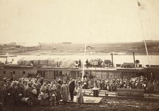 Party of exiles and convicts embarking on river barge at Tumen [ie, Tiumen]..., between 1885 and 86. Creator: Unknown