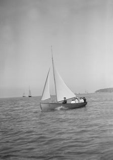 Party sailing on the Earl of Normanton's Cutter, 1911. Creator: Kirk & Sons of Cowes