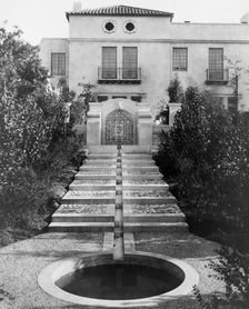 Pasadena, California, Mrs. Herbert Coppell home - pond at foot of long stairway leading..., 1917. Creator: Frances Benjamin Johnston