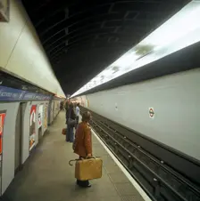 Passengers waiting at Blackhorse tube station on the Victoria Line, London, 1974. Creator: Michael Walters