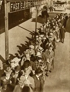 Passengers waiting at Goldhawk Road Station in London during the railway strike, 1919, (1935). Creator: Unknown