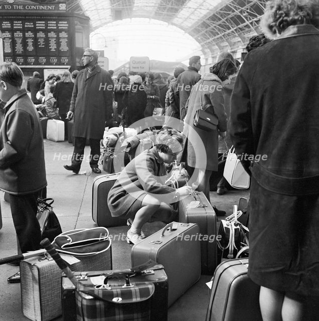Passengers at Victoria Station, London, 1960-1972. Artist: John Gay