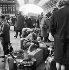 Passengers at Victoria Station, London, 1960-1972. Artist: John Gay
