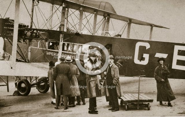 Passengers boarding an Imperial Airways aircraft for a flight to Paris, c1924-c1929 (?) Artist: Unknown