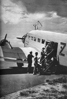 Passengers boarding one of the Junkers airliners of South African Airways, c1936 (c1937)